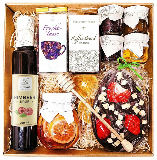 Geschenkkorb zu Ostern: Ostergeschenk mit Tee, Honig, Schokolade und Osterei