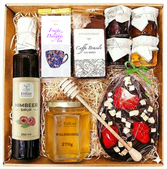 Geschenkkorb zu Ostern: Ostergeschenk: Präsent mit Tee, Honig & Schokoladenei