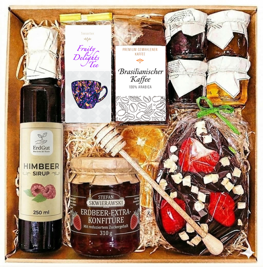 Geschenkkorb zu Ostern: Ostergeschenk: Präsent mit Osterei, Tee, Honig und Schokoladenei