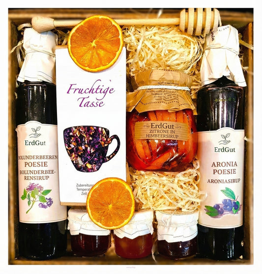 GESCHENKKORB MIT HONIG TEE ZITRONEN UND HIMBEERSIRUP
