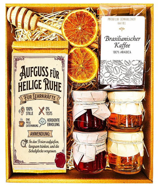 Geschenkkorb mit Tee, Kaffee, Honig und Marmelade